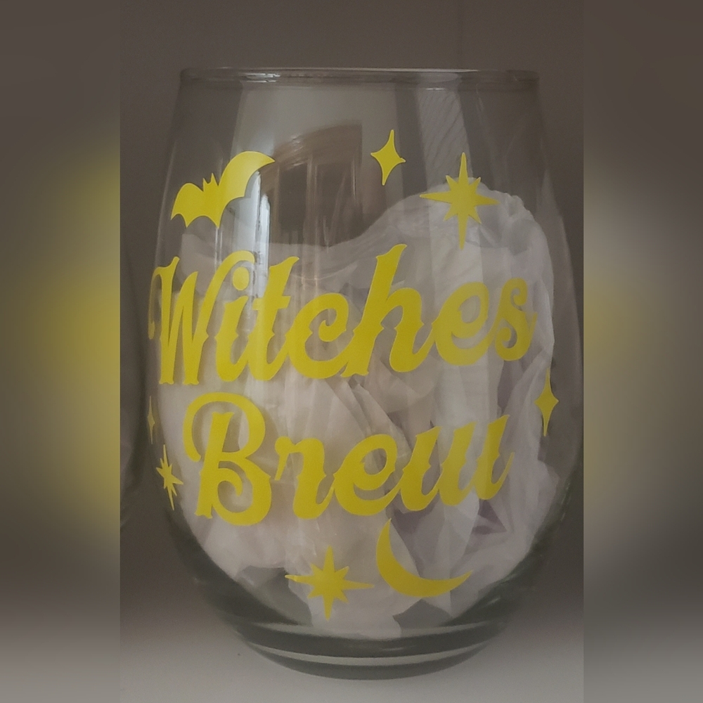Handcrafted wine glass says witches BREW. NEW